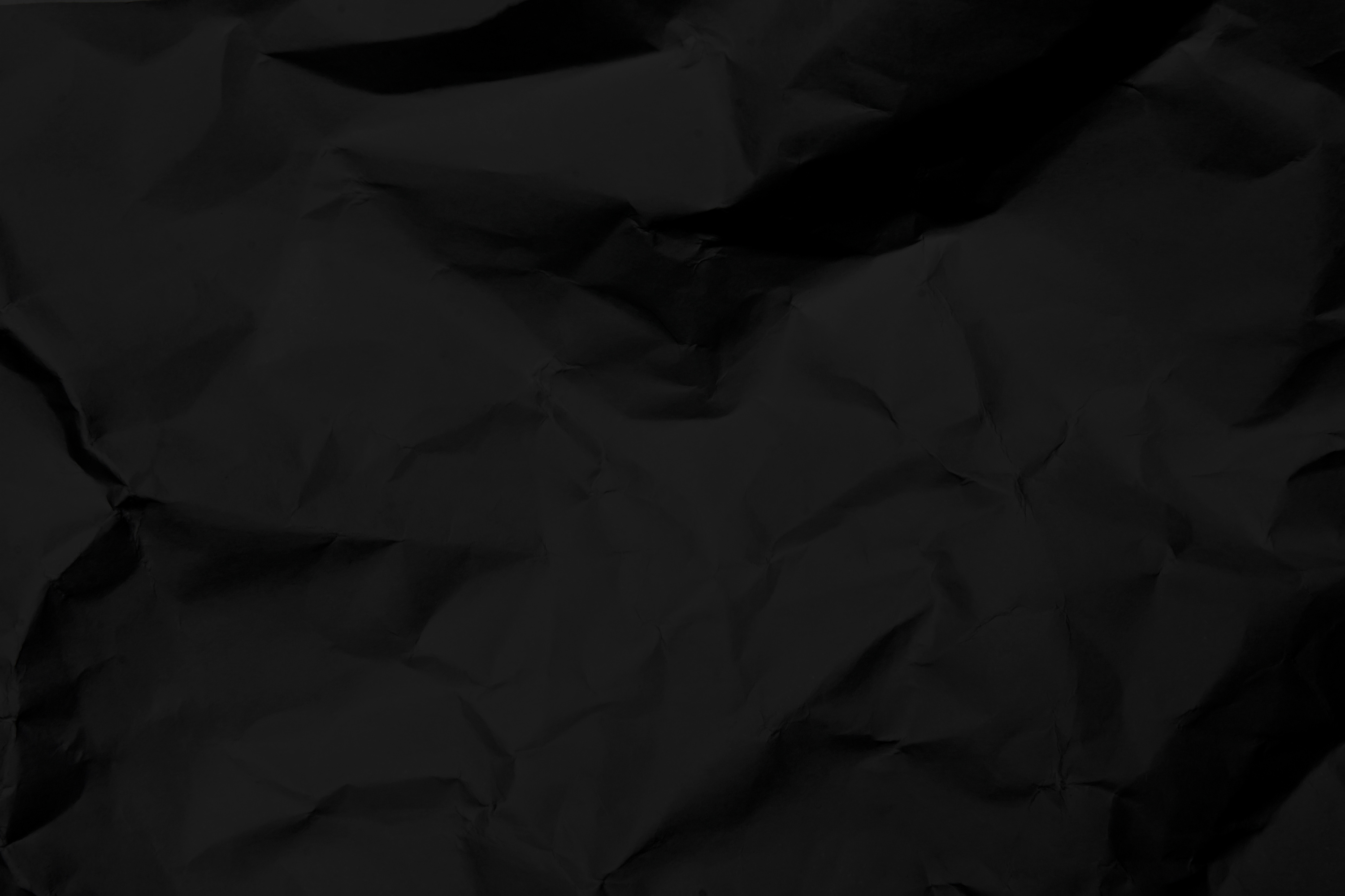 Black Crumpled Paper Texture Background. Black Wrinkled Paper Te